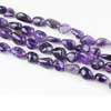 Natural Purple Amethyst Smooth Tumble Beads Strand Length 14 Inches and Size 11mm to 14mm approx. Pronounced AM-eth-ist, this lovely stone comes in two color variations of Purple and Pink. This gemstones belongs to quartz family. All strands are hand picked. 
